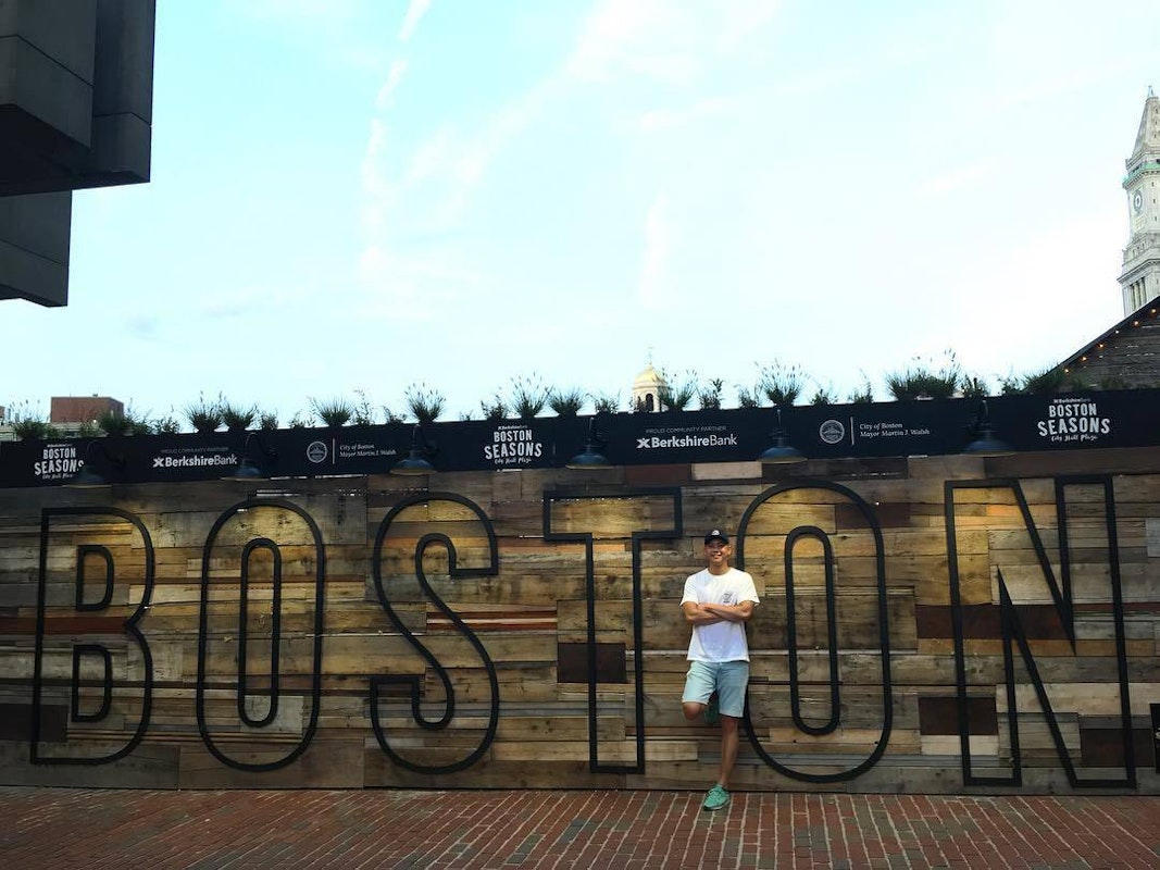 Peter at the Boston sign